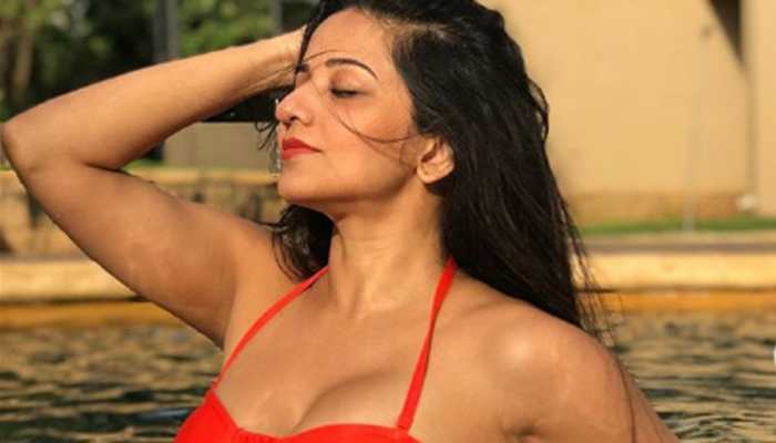 Monalisa raises the temperature in a red swimwear—See pic