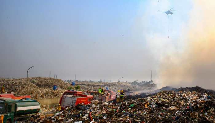 IAF helicopter engaged in fire fighting operations in Coimbatore  