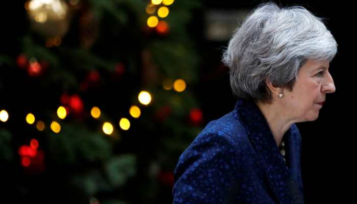 Death knell for Theresa May's Brexit deal as lawmakers reject it by 286 to 344