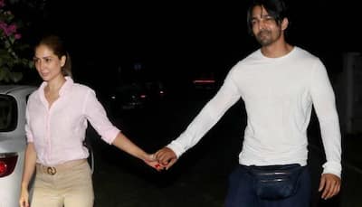 Amid break-up rumours, Kim Sharma-Harshvardhan Rane get snapped hand-in-hand