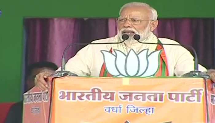 Congress' abuses are my badge of honour: PM Narendra Modi at Wardha rally Congress' abuses are my badge of honour: PM Narendra Modi at Wardha rally