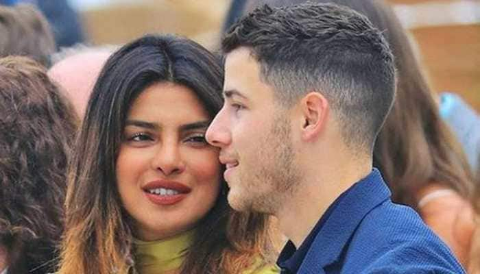 Priyanka Chopra trips, clasps Nick&#039;s arm, avoids fall