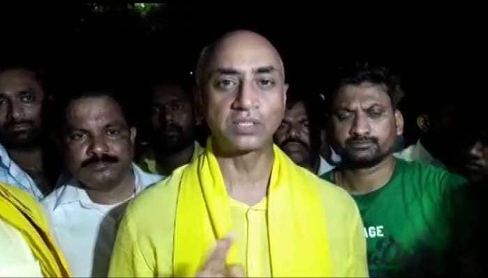 Guntur MP Galla Jayadev, TDP leaders stage dharna over IT raids; call it &#039;vendetta politics&#039;