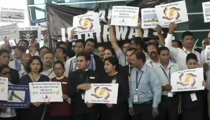 Jet Airways&#039; employees protest outside Delhi airport over delay in payment