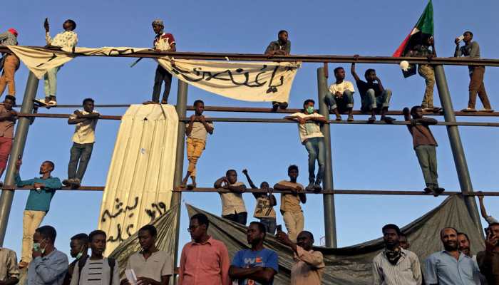 Sudan's intelligence chief quits, protesters keep up pressure