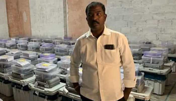 TRS polling agent arrested for clicking photo inside EVM strong room in Telangana TRS polling agent arrested for clicking photo inside EVM strong room in Telangana