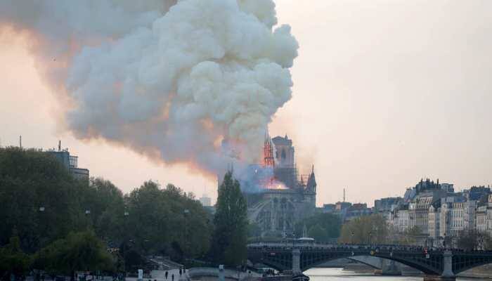 Fire guts Notre-Dame Cathedral in Paris, French President Emmanuel Macron pledges to rebuild