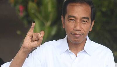 Indonesian ruling coalition leads in unofficial count of parliamentary vote: Pollster
