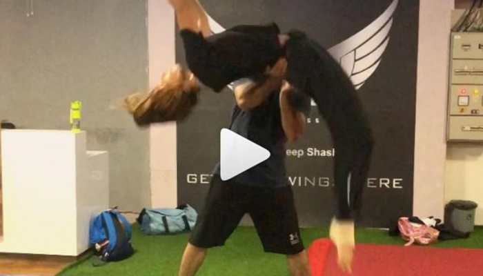 This video of Disha Patani learning to do a back handspring will give you major fitness goals-Watch
