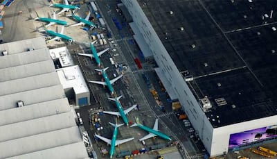 Boeing suffers $1 billion hit from 737 Max crisis, abandons 2019 financial outlook