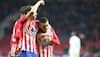 La Liga: Atletico Madrid put Barcelona celebrations on ice with win over Valencia