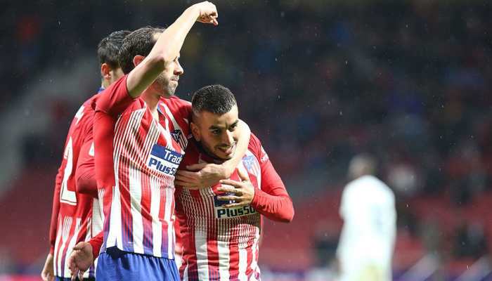 La Liga: Atletico Madrid put Barcelona celebrations on ice with win over Valencia