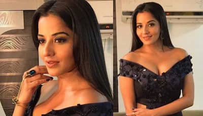 Monalisa strikes a pose in a floral dress with a plunging neckline—See pic