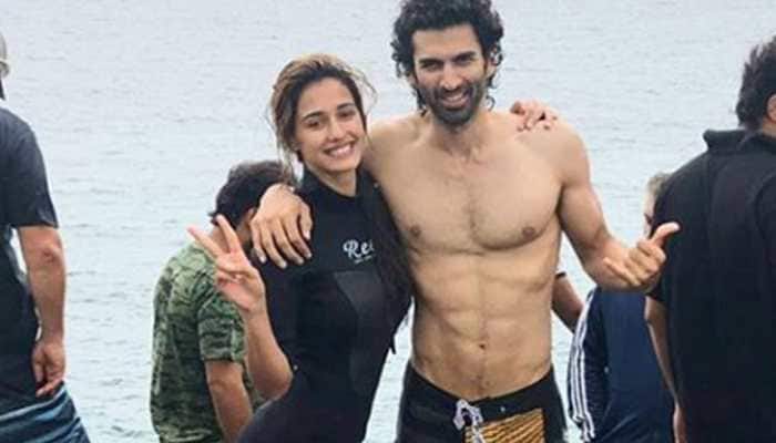 Disha Patani and Aditya Roy Kapur are all smiles in this BTS pic from 'Malang'
