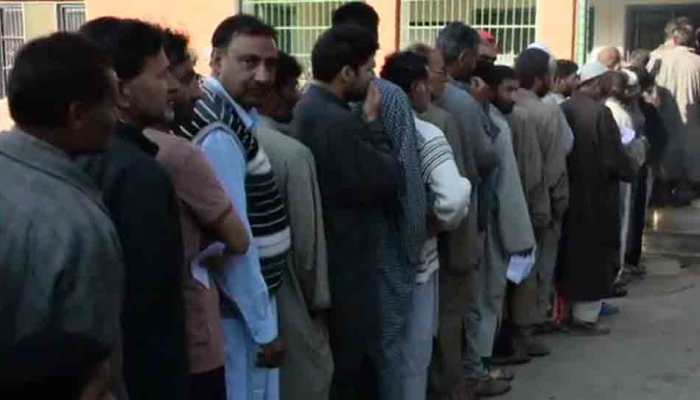 J&amp;K: Terrorists lob grenade at Pulwama polling booth, school building set afire in Shopian