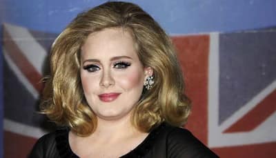 Adele in good place after difficult split from husband