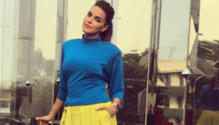 Don't believe in showmanship of a child: Neha Dhupia