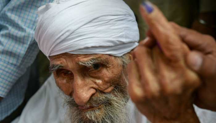 111-year old Bachan Singh, the oldest voter in Delhi, casts vote 