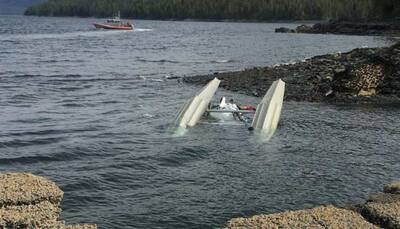 Two missing in Alaskan waters after tour planes crash; probe begins