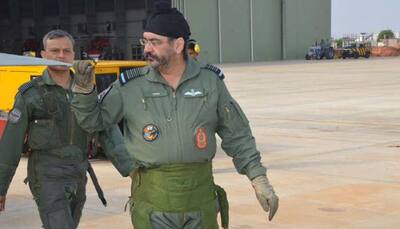 IAF Chief Birender Singh Dhanoa visits Sulur air base, inspects Tejas, flies 'formidable war machine' MiG-21