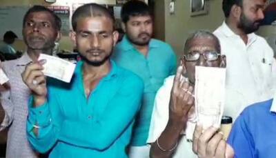 BJP workers forcefully applying ink on fingers of Dalit voters in Uttar Pradesh's Chandauli: SP