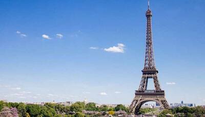 Eiffel Tower evacuated after man tries to scale it, monument closed for visitors