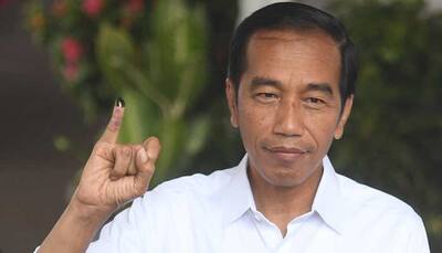 Official count gives President Widodo victory in Indonesian election, opposition claim cheating