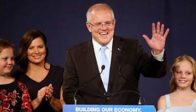 Australia PM struggles to meet tax relief election pledge, central bank urges stimulus