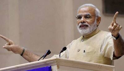 Narendra Modi meets officials and staff of PMO after landslide win in Lok Sabha polls