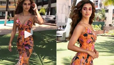 Disha Patani twirling by the pool will give you major weekend vibes-Watch 