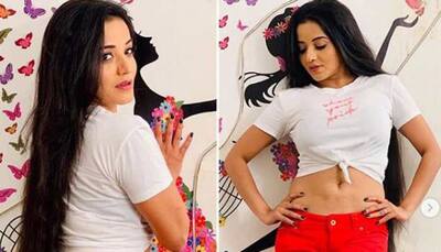 Monalisa dazzles in red hot pants and white t-shirt-See pic