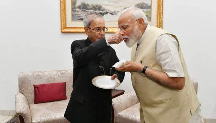 Narendra Modi calls on Pranab Mukherjee, seeks his blessings for second term as PM