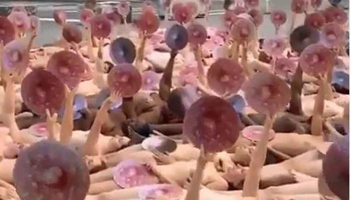 Wethenipple: Dozens strip naked outside Facebook HQ in censorship protest