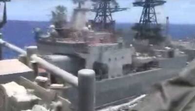 Watch dramatic video of near collision between US and Russian warships in South China Sea