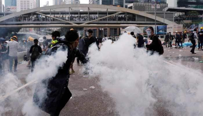 Hong Kong shuts offices for the week after worst-ever violence over extradition bill