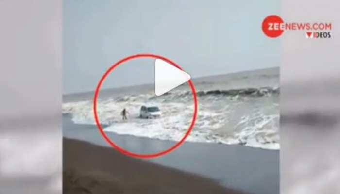 Watch: Car goes for a swim near Mumbai beach, tractor turns lifeguard
