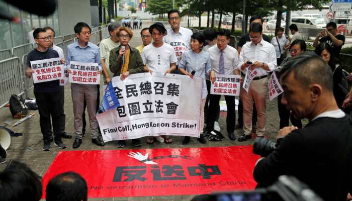 'Sea of black' Hong Kong protesters demand leader step down