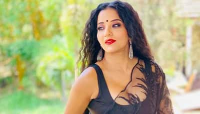 Monalisa sizzles in a sheer black saree, shows offer her desi look—See pics