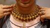 Gold edges up by Rs 100, silver rises Rs 130