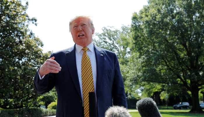 'Not my type', says Donald Trump as he denies raping television show host