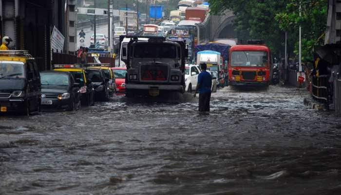 Heavy rains kill 3, injure 2 in Mumbai; trigger traffic snarls, train cancellation