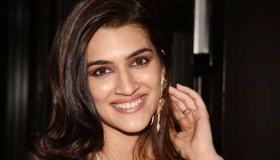 Kriti Sanon gets papped in floral skirt and black knotted crop top, flashes her million dollar smile at paps – Pics