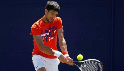 Regular as clockwork, Novak Djokovic eases into Wimbledon third round