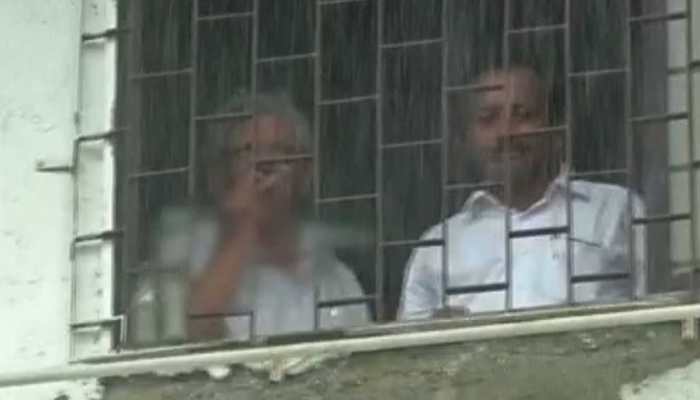 CPI(M) General Secretary Sitaram Yechury smokes inside court premises