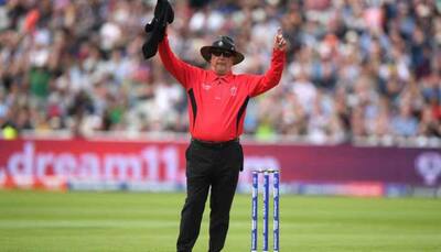 Umpire Gould prepares to raise his finger for the final time at Headingley