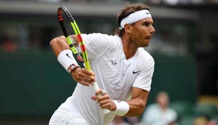 Nadal bursts Sousa''s bubble to reach Wimbledon quarters