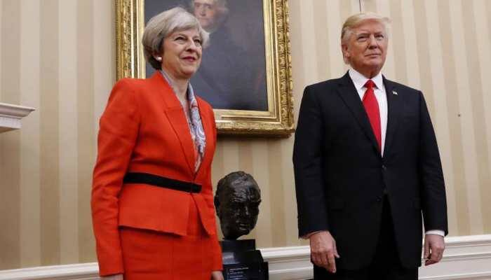 Trump blasts 'foolish' UK PM May and her 'wacky' envoy over leaked memos