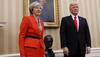 Trump blasts 'foolish' UK PM May and her 'wacky' envoy over leaked memos