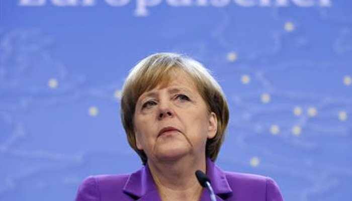 Merkel has third bout of shaking, says she is fine and 'working through' issue