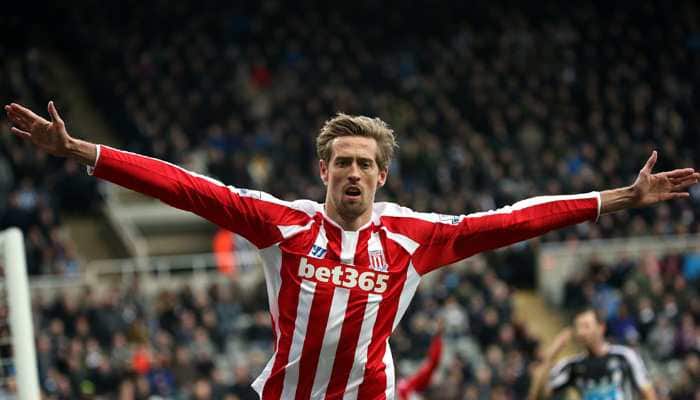 Former England striker Peter Crouch announces retirement